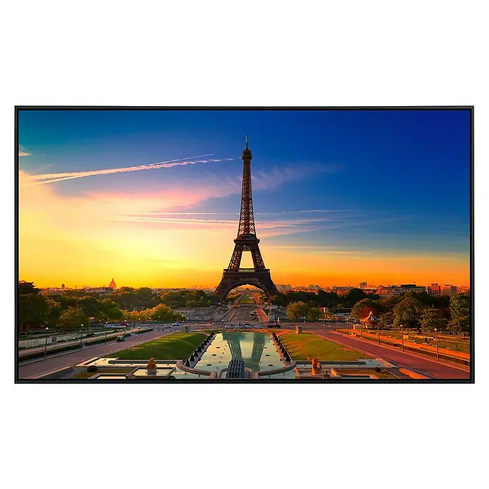Papermoon Infrarot-Bildheizkörper Pariser Eiffelturm 1 - 100 x 60 cm, 800 W - Nahaufnahme eines Fernsehers mit dem Eiffelturm bei Sonnenuntergang auf dem Bildschirm. Lebendige Farben und hohe Auflösung.