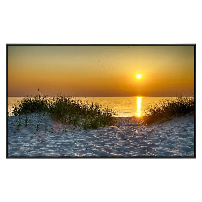 Papermoon Infrarot-Bildheizkörper Dunes Lake Michigan - 100 x 60 cm, 600 W - Goldener Sonnenuntergang am Strand, das warme Licht spiegelt sich im Sand und Wasser wider. Ruhige Szene mit Dünen und Gras im Vordergrund.