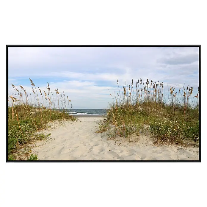 Papermoon Infrarot-Bildheizkörper Dünen Huntington Beach - 100 x 60 cm, 800 W - Dünenlandschaft mit Sandweg zum Meer, Gras und blauem Himmel. Die ruhige Szene vermittelt ein Gefühl von Frieden und Urlaub.