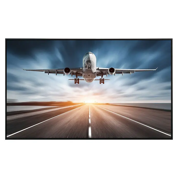 Papermoon Infrarot-Bildheizkörper Flugzeugstraße Sonnenuntergang - 100 x 60 cm, 600 W - Bildschirm mit einem Flugzeug, das auf einer Startbahn landet, wodurch die Details und die Bildschirmqualität hervorgehoben werden.