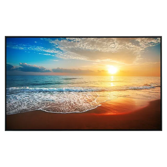 Papermoon Infrarot-Bildheizkörper Strand Sonnenuntergang 2 - 120 cm x 600 mm, 1.200 W - Fernseher mit Strandlandschaft bei Sonnenuntergang. Das Display zeigt ein ruhiges Meer und einen farbenprächtigen Himmel.