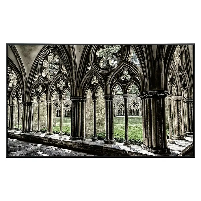 Papermoon Infrarot-Bildheizkörper Mittelalterliche Kathedrale - 100 x 60 cm, 600 W - Historischer Kreuzgang mit gotischen Bögen und Säulen, umgeben von einem grünen Innenhof. Die feine Steinmetzarbeit und das friedliche Ambiente laden zum Verweilen ein.