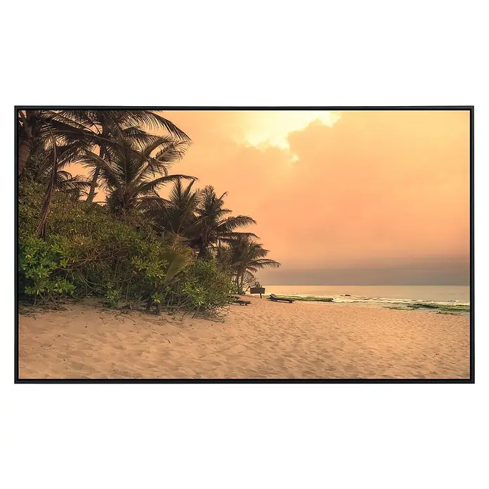 Papermoon Infrarot-Bildheizkörper Sri Lanka Tangalle Strand - 90 x 50 cm, 450 W - Tropische Küstenlandschaft mit Palmen, Sandstrand und orangefarbenem Himmel, die eine ruhige und friedliche Atmosphäre vermittelt.