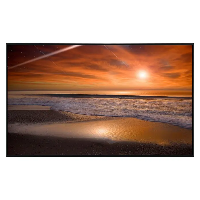 Papermoon Infrarot-Bildheizkörper Bulgarische Schwarzmeerküste - 120 x 60 cm, 1.000 W - Sonnenuntergang über dem Meer mit orangefarbenem Himmel und reflektierendem Wasser, eingefasst in einen modernen schwarzen Rahmen.