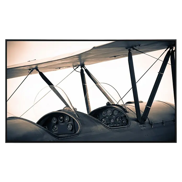 Papermoon Infrarot-Bildheizkörper Vintage Flugzeug - 60 x 50 cm, 350 W - Detailaufnahme des Cockpits eines historischen Doppeldeckers mit Instrumenten und Flügelstreben in Sepiatönen.