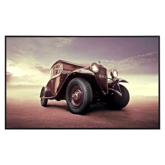 Papermoon Infrarot-Bildheizkörper Posing Oldtimer - 90 x 50 cm, 450 W - Elegantes Oldtimer-Auto mit Scheinwerfern und stilvollem Design vor einem dramatischen Himmel, ideal für Sammler klassischer Fahrzeuge.