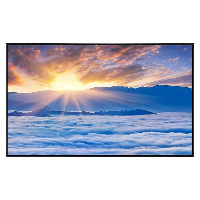 Papermoon Infrarot-Bildheizkörper Sonnenaufgang über den Wolken - 100 x 60 cm, 600 W - Der moderne Fernseher zeigt ein atemberaubendes Bergpanorama bei Sonnenaufgang, das durch lebendige Farben und hohe Auflösung besticht.