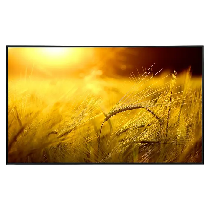 Papermoon Infrarot-Bildheizkörper Goldener Schein - 120 x 60 cm, 1.000 W - Ein atemberaubendes Landschaftsbild von reifem Getreide im goldenen Licht der Sonne, eingefasst in einem modernen, schwarzen Rahmen.