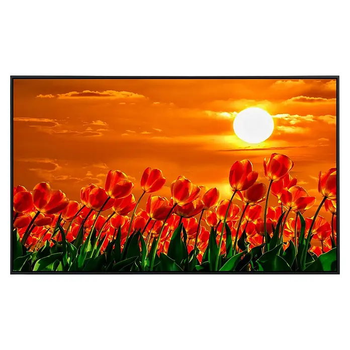 Papermoon Infrarot-Bildheizkörper Rote Tulpen - 60 x 50 cm, 350 W - Das Bild zeigt einen Fernseher, der ein leuchtendes Sonnenblumenfeld bei Sonnenuntergang mit warmen Farben darstellt.