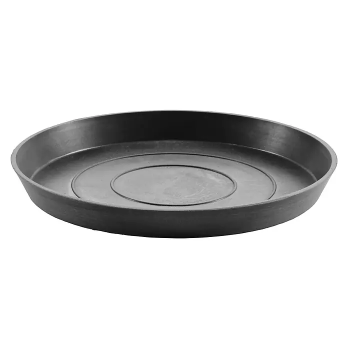 Ecopots Amsterdam Blumentopf-UntersetzerAußenmaß (Ø x H): 29 x 3 cm, Kunststoff, Dunkelgrau - Aufnahme von unten eines runden, dunklen Untersetzers für Pflanzen. Der robuste Untersetzer ist ideal, um Wasser aufzufangen und Oberflächen zu schützen.