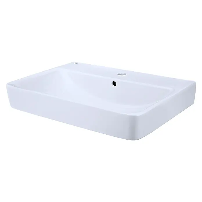 Geberit Renova Plan Waschtisch-Set - 65 x 48 cm, Ohne Spezialglasur, Hahnloch: Mitte, Mit Überlauf, Weiß - Nahaufnahme eines weißen Keramik-Waschbeckens mit Überlauf und Hahnloch, ideal für moderne Badezimmer.