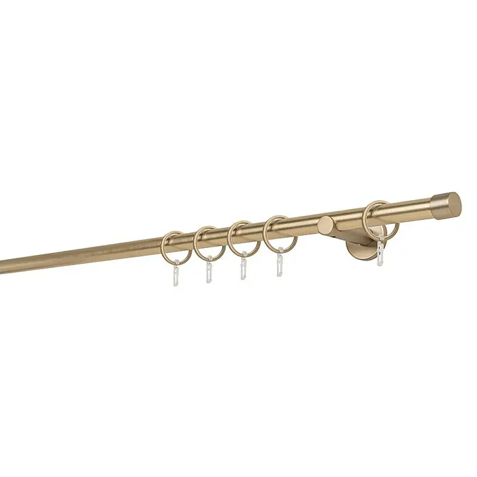 Stilgarnitur Function CapLänge Gardinenstange: 150 cm, Messing Matt - Nahaufnahme einer goldenen Gardinenstange mit Ringen und transparenten Haken. Ideal für stilvolle Fensterdekoration.