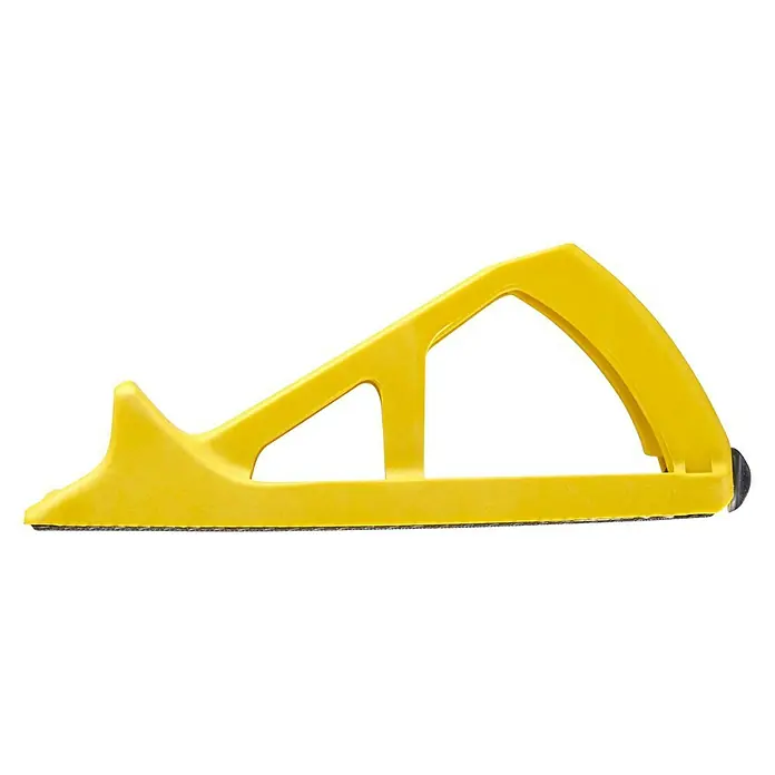 Stanley Blockhobel Surform - Kunststoff, Länge: 270 mm - Nahaufnahme eines gelben Handschleifers mit flacher Unterseite zum Glätten von Oberflächen, ideal für Heimwerker.