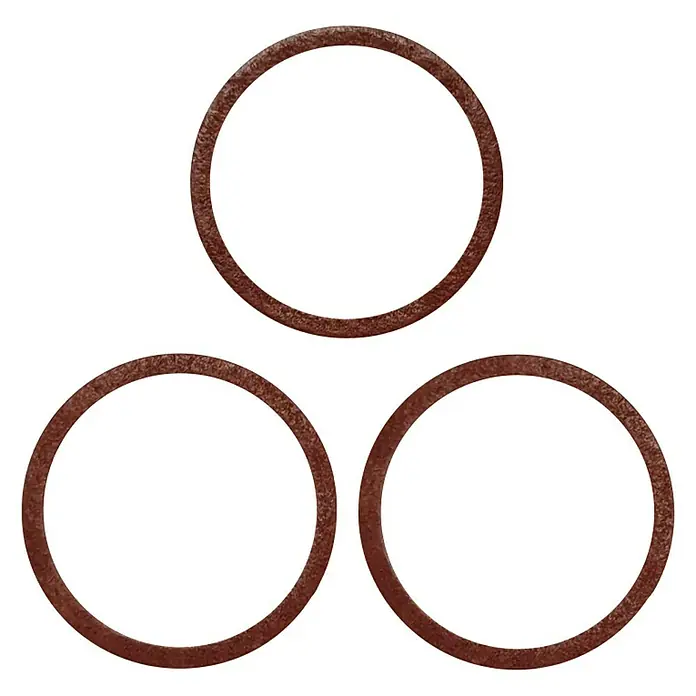 Fiberringe - ½″, 3 Stk. - Braune Dichtungsringe, ideal für Abdichtungen in verschiedenen Anwendungen, liegen auf einem schwarzen Hintergrund.