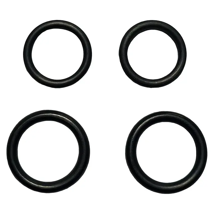 O-Ring Sortiment - ½″ x ¾″, Geeignet für: Schwenkausläufe, 4 Stk. - Vier schwarze O-Ringe liegen auf einem dunklen Untergrund. Die Dichtungsringe sind für verschiedene Anwendungen geeignet und widerstandsfähig.