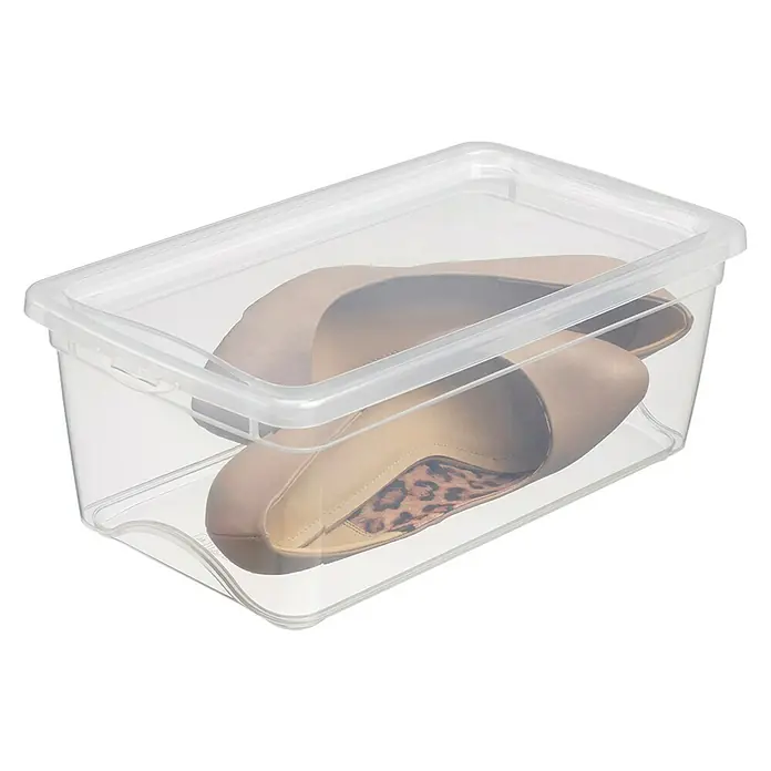 Sunware Aufbewahrungsbox Omega - L x B x H: 33,7 x 19,4 x 12,6 cm, Kunststoff, Transparent - Das Foto zeigt eine durchsichtige Aufbewahrungsbox mit einem Paar beiger High Heels darin. Die Box ist mit einem Deckel verschlossen.