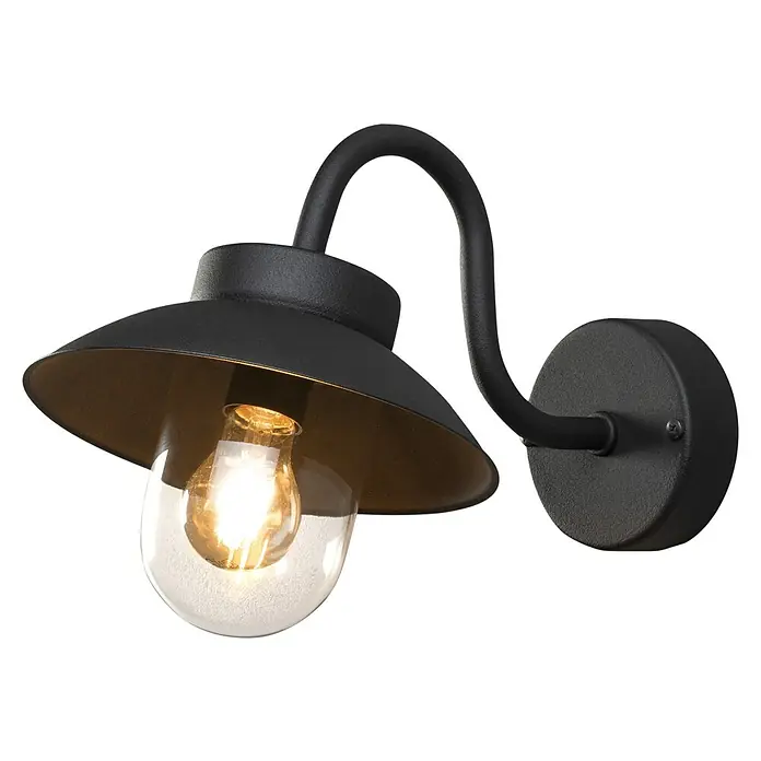 Konstsmide Außenwandleuchte Vega Mini - 60 W, Schwarz, IP44 - Eine stilvolle schwarze Wandleuchte mit einem klaren Glasschirm und einer warm leuchtenden Glühbirne vor einem schwarzen Hintergrund.