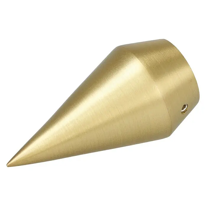 Expo Ambiente Endstück Point - Messingoptik matt, Geeignet für: Gardinenstangen Ø 20 mm, 2 Stk. - Nahaufnahme eines goldenen, kegelförmigen Metallobjekts, das auf einem schwarzen Hintergrund liegt. Hervorhebung der glänzenden Oberfläche und Form.