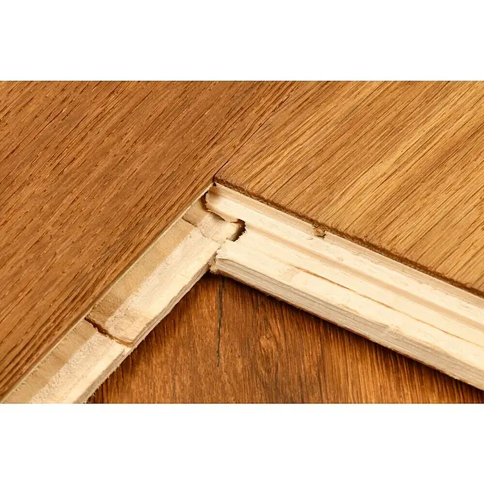 Parkett - Eiche Byzanz, Landhausdiele, 1.900 x 190 x 14 mm - Beschädigtes Laminat: Detailaufnahme eines kaputten Laminatbodens mit sichtbaren Schäden an der Oberfläche und den Verbindungsstücken.