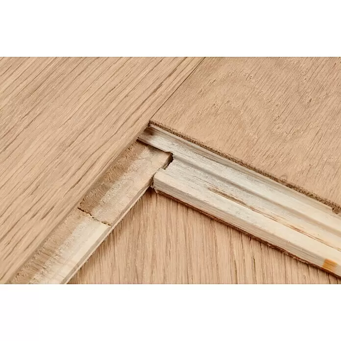 Parkett - Eiche Inntal rustikal, Landhausdiele, 1.900 x 190 x 14 mm - Beschädigte Holzfußbodenverbindung, zeigt die Nut-Feder-Verbindung.