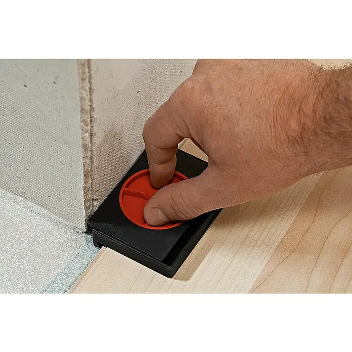 Bessey Abstandhalter - 4 Stk. - Das Bild zeigt ein Werkzeug zum präzisen Anpassen von Bodenbelägen an Wände, ideal für Renovierungen und Neubauten, für eine perfekte Passform.