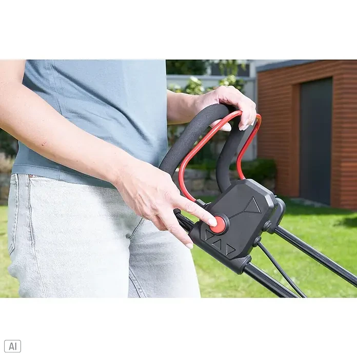 AL-KO Bosch Home & Garden Compatible Akku-Rasenmäher 3.22 Li Easy - 18 V, 2 Akkus, 2,5 Ah, Schnittbreite: 32 cm - Eine Person bedient einen Rasenmäher mit einem roten Knopf zum Starten. Der Rasenmähergriff ist schwarz mit roten Akzenten.