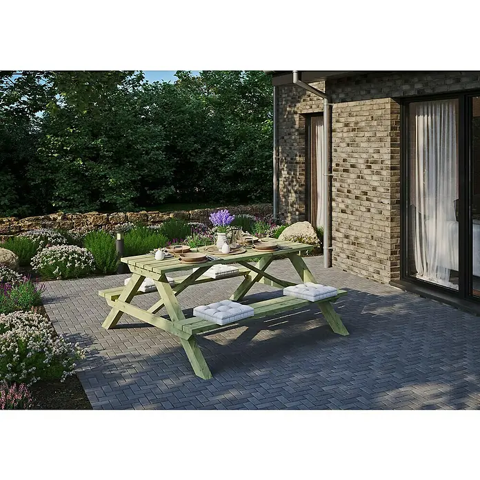 T & J Picknicktisch Ella - L x B x H: 170 x 180 x 75 cm, Grünlich - Einladender Picknicktisch aus Holz mit Sitzkissen auf einer gepflasterten Terrasse. Perfekt für Mahlzeiten im Freien mit Familie und Freunden.