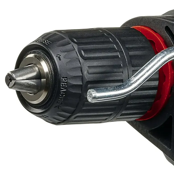Einhell Schlagbohrmaschine TC-ID 720/1 E - 720 W, 2.800 U/min, Max. Schlagzahl: 44.800 /min - Nahaufnahme einer Bohrmaschine, die das Bohrfutter und den Verriegelungsmechanismus hervorhebt. Das Werkzeug präsentiert sich in professioneller Ausführung.