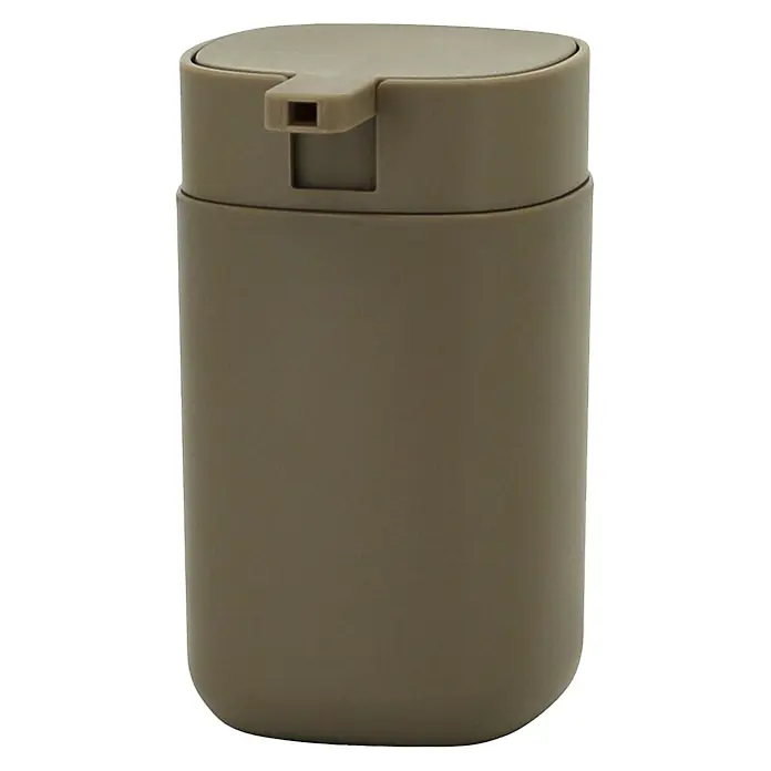 Aquasanit Kubik Dispensador de jabón - L x An x Al: 7 x 7 x 12 cm, Plástico, Beige - Imagen de un dispensador de jabón cilíndrico beige con una parte superior ligeramente redondeada y un pico dispensador.