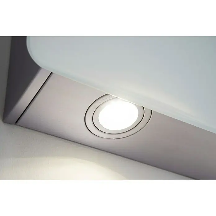 Respekta Schräghaube Elva - Breite: 60 cm, Max. Gebläseleistung Abluftbetrieb: 449,9 m³/h, Weiß/Silber - Nahaufnahme einer hellen Einbaulampe unter einem Küchenschrank, die eine funktionale und moderne Beleuchtungslösung bietet.