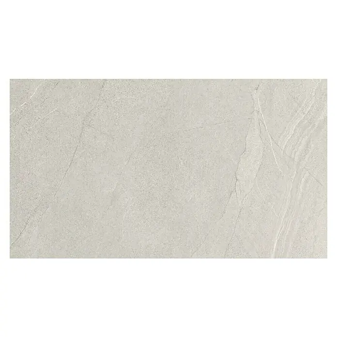 Pavimento porcelánico Halley - 30 x 60 cm, Light, Mate, Rectificado - Primer plano de una baldosa cerámica beige con efecto mármol, ideal para diseños modernos de suelos y paredes.\n