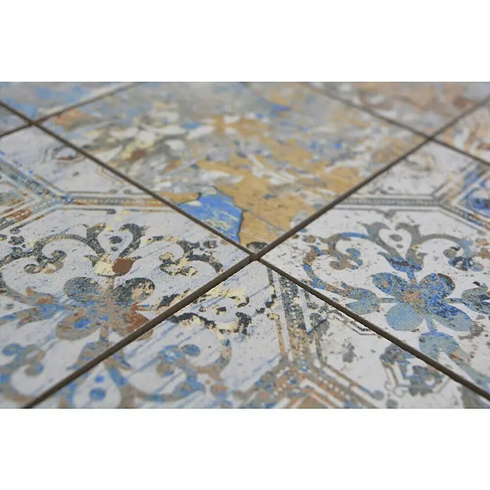 Mosaikfliese Quadrat Curtain 95 Strong Colour Mix CV 95MSC - 29 x 29 cm, Beige/Braun/Blau, Matt - Nahaufnahme von dekorativen Keramikfliesen mit einem floralen Muster in Blau-, Grau- und Gelbtönen. Die Fliesen sind quadratisch und durch Fugen getrennt.