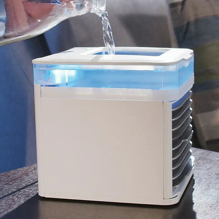 Arctic Air Climatizador evaporativo Pure Chill - L x An x Al: 17,8 x 20 x 24,8 cm - Un enfriador de aire evaporativo portátil se llena con agua para humidificar y enfriar el aire.