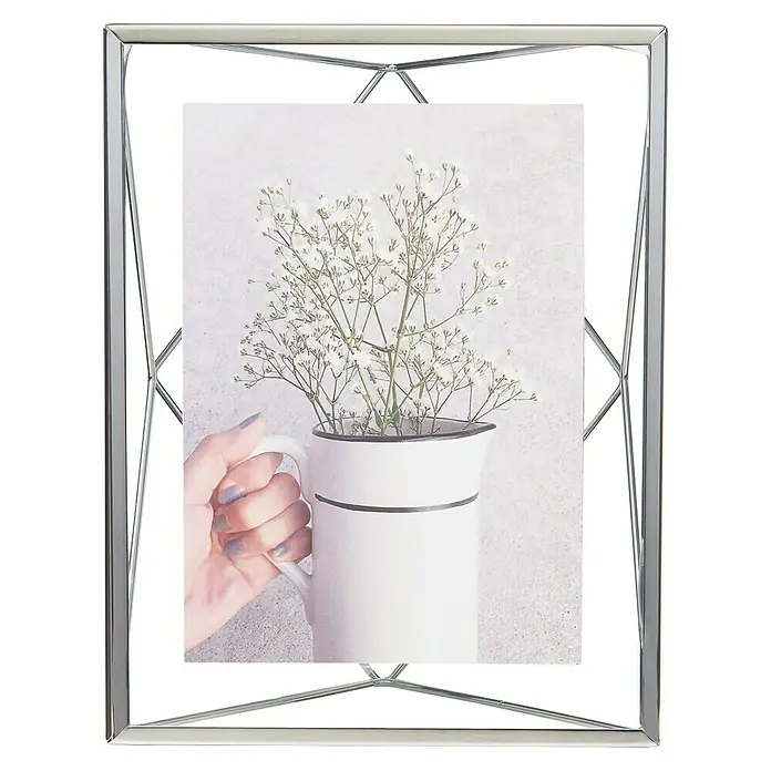 Umbra Bilderrahmen Prisma - 13 x 18 cm, Chrom, Glas - Eleganter, rechteckiger Fotorahmen mit einem minimalistischen Design, das durch filigrane, geometrische Akzente eine moderne Note erhält. Perfekt für stilvolle Fotos.