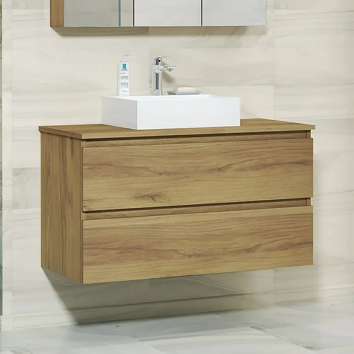 Artysan Mueble bajo de lavabo Fons - L x An x Al: 44,6 x 100 x 64 cm, Roble Guadarrama - Un tocador de baño con dos cajones de aspecto de madera y un lavabo sobre encimera. Encima, un armario con espejo está montado en la pared.