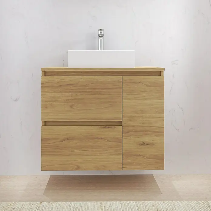 Artysan Mueble bajo de lavabo Farbe - L x An x Al: 44,6 x 70 x 64 cm, Roble guadarrama - Primer plano de un mueble de baño de madera con lavabo y grifo frente a una pared de mármol.