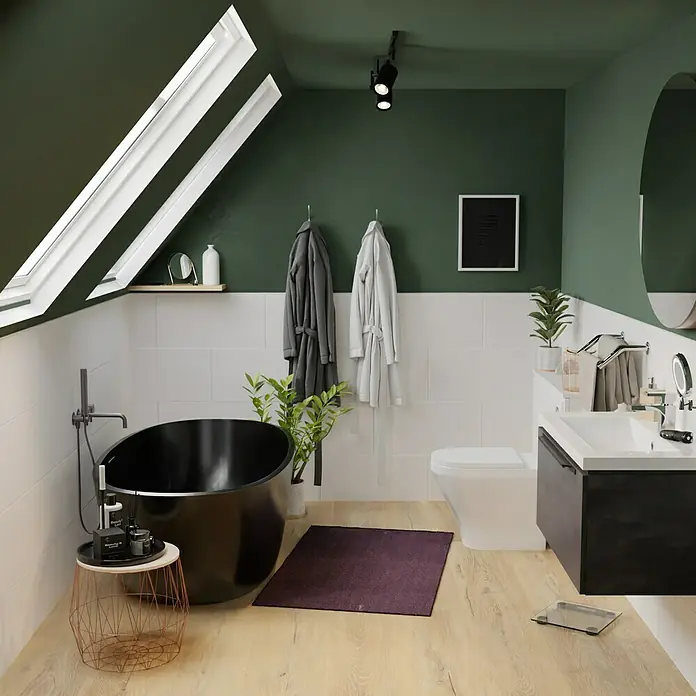 Wandfliese20 x 50 cm, Weiß, Matt - Stylisches Badezimmer mit schwarzer Badewanne, weißen Fliesen und grünen Akzenten für eine moderne Atmosphäre.