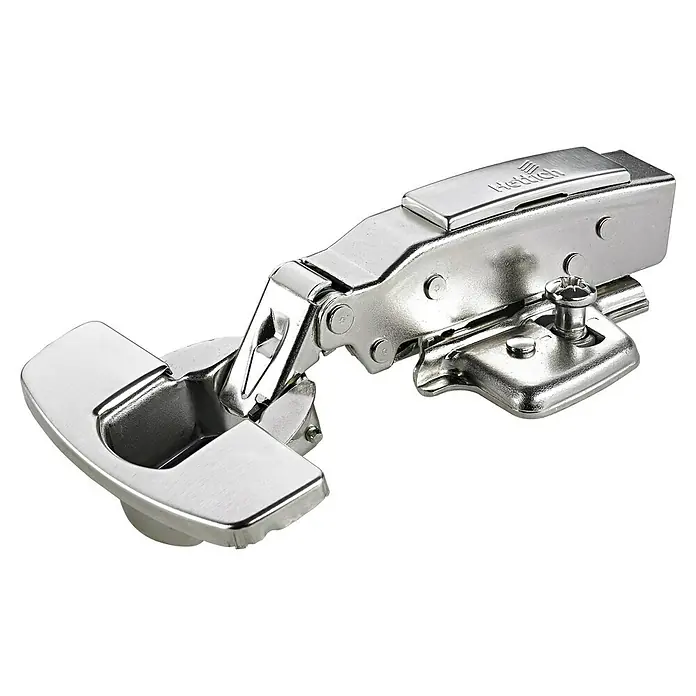 Hettich Topfscharnier - Anschlagart: Vorliegend, Durchmesser Topf: 35 mm, Öffnungswinkel: 0 ° - 110 °, Silber - Nahaufnahme eines glänzenden, silberfarbenen Möbelscharniers der Marke Hettich vor schwarzem Hintergrund.