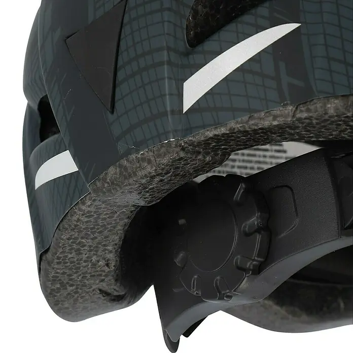 Fischer Fahrradhelm Urban Plus Brooklyn - S/M 52 - 59 cm, Schwarz - Nahaufnahme eines Fahrradhelms mit dunklem Muster und Verstellmechanismus für eine sichere Passform.