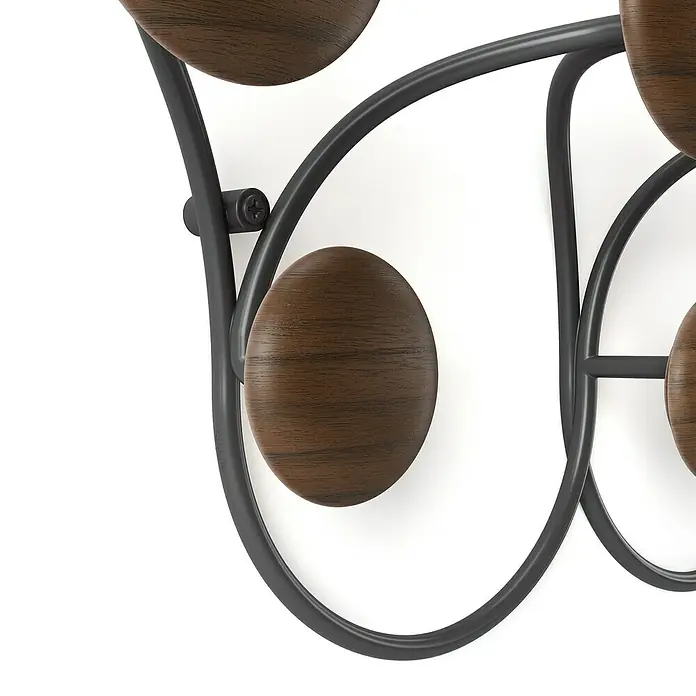 Umbra Garderobenleiste Dotsy - L x B x H: 10,5 x 43,2 x 17,2 cm, Anzahl Haken: 7 Stk., Schwarz - Nahaufnahme einer stilvollen Wandgarderobe mit Holzknöpfen und einem eleganten Metallrahmen. Perfekt für moderne Einrichtungen.