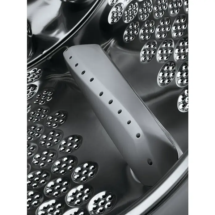 AEG Lavadora EN7F4722AN - L x An x Al: 55,3 x 59,6 x 81,9 cm, 7 kg, Potencia máx.: 2.200 W - Detalle interior de una lavadora con un deflector de tambor perforado para distribuir el agua.