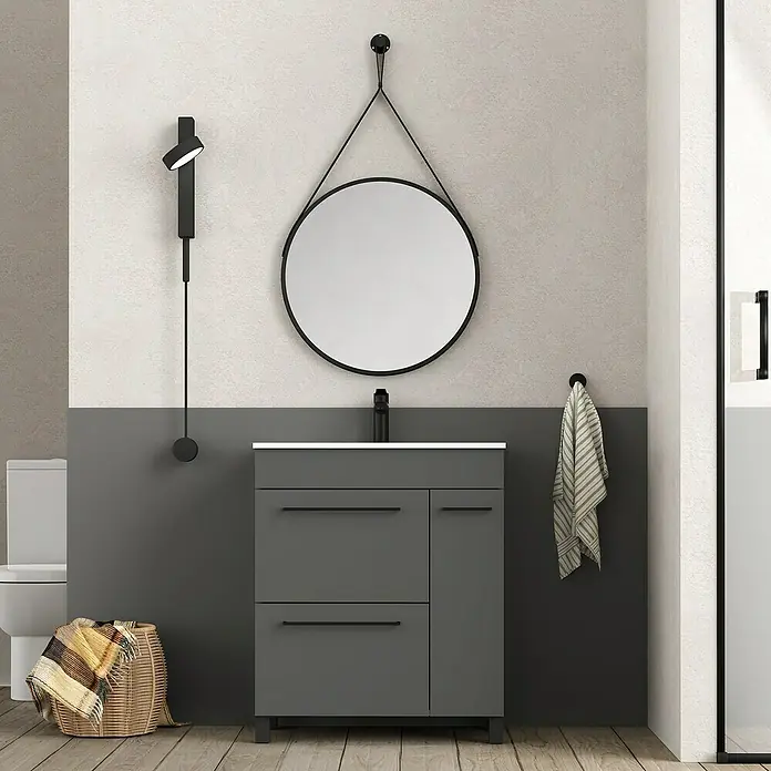 Artysan Mueble bajo de lavabo Tabarca - L x An x Al: 44,6 x 70 x 83,3 cm, Antracita - Baño con un moderno mueble de lavabo gris, espejo redondo y toallero, creando un diseño elegante y funcional.