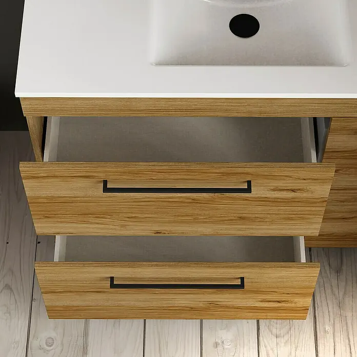 Artysan Mueble bajo de lavabo Tabarca - L x An x Al: 44,6 x 100 x 83,3 cm, Roble Guadarrama - Primer plano de un mueble de lavabo con dos cajones abiertos, con tiradores modernos y vetas de madera clara.