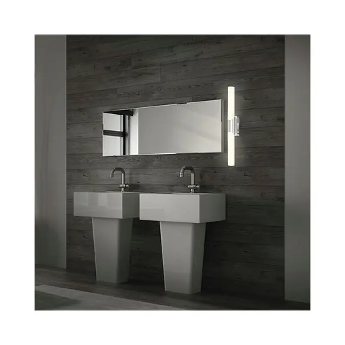 Briloner Aplique LED para espejo Klak - L x An x Al: 6,8 x 6,5 x 47 cm, Blanco/plateado, Blanco neutro - Baño moderno con dos lavabos blancos con pedestal, espejo e iluminación frente a una pared de madera oscura. Diseño elegante para un ambiente estiloso.