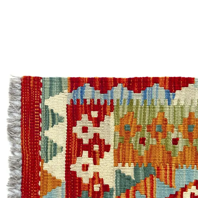 Alfombra de pelo corto Kilim Herat - Multicolor, 90 x 60 cm, 100% lana - Primer plano de una alfombra hecha a mano con diseños tradicionales y colores vivos.