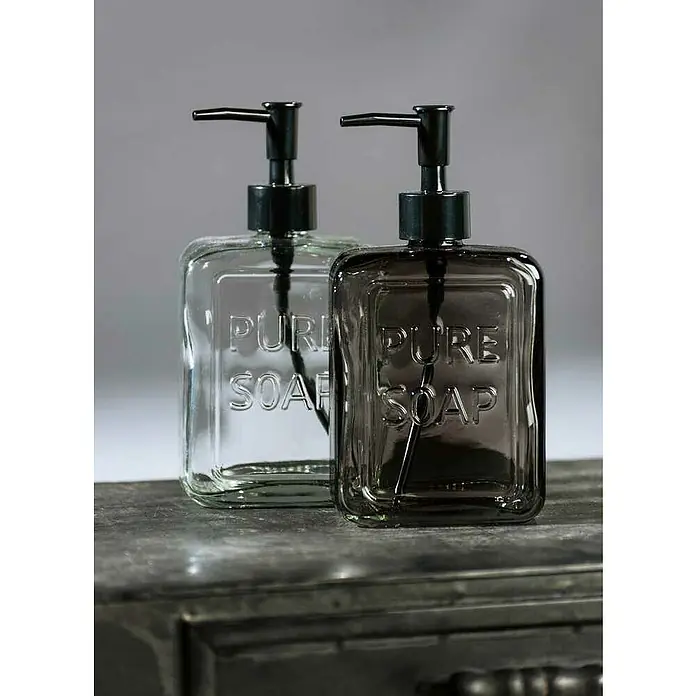 Wenko Seifenspender Pure Soap - Glas, Grau - Zwei elegante Seifenspender aus Glas mit der Aufschrift "Pure Soap" und schwarzen Pumpen. Perfekt für Bad oder Küche.