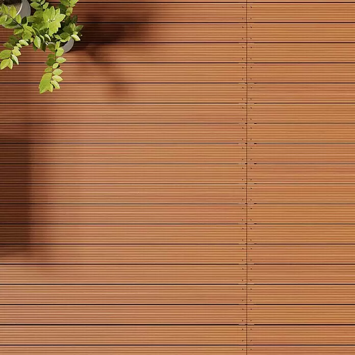 Terrassendiele Premium/Select - Bangkirai, 396 x 14,5 x 2,5 cm, Braun - Braune gerillte WPC-Terrassendielen, teilweise von einer Pflanze beschattet, mit Schrauben.