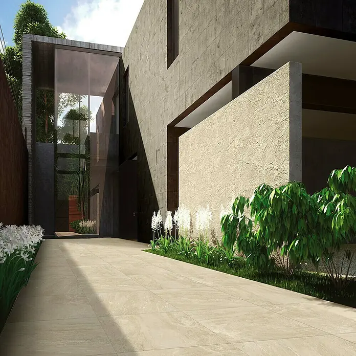 Diephaus Terrassenfliese Columbia - 60 x 60 x 4 cm, Perlmutt, Beton - Eine Nahaufnahme eines modernen Gebäudes mit beigefarbenen Steinplatten, das einen eleganten und minimalistischen Stil präsentiert.