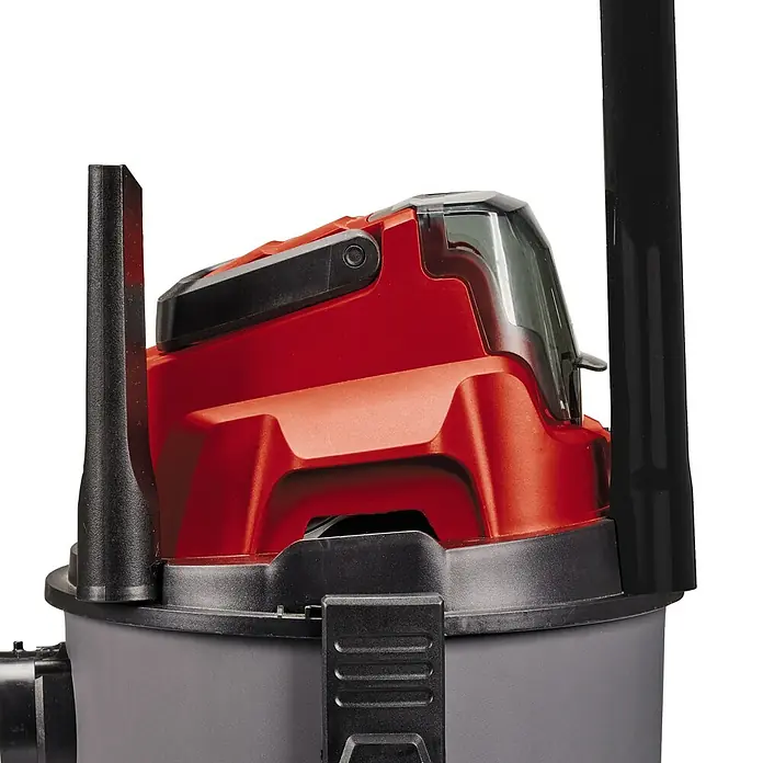 Einhell Power X-Change 18V Akku-Nass-Trockensauger TC-VC 18/15 Li-Solo - 18 V, Ohne Akku, Behältervolumen: 15 l - Detailaufnahme eines rot-grauen Nass-Trockensaugers mit schwarzem Zubehör, ideal für Werkstatt und Baustelle.