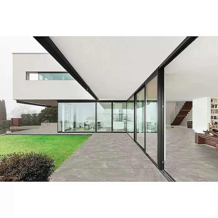 Diephaus Terrassenfliese Columbia - 60 x 60 x 4 cm, Quarzit, Beton - Graue Steinoptik-Terrassenfliesen schaffen einen nahtlosen Übergang vom modernen Hausinneren zu einer Grünfläche.